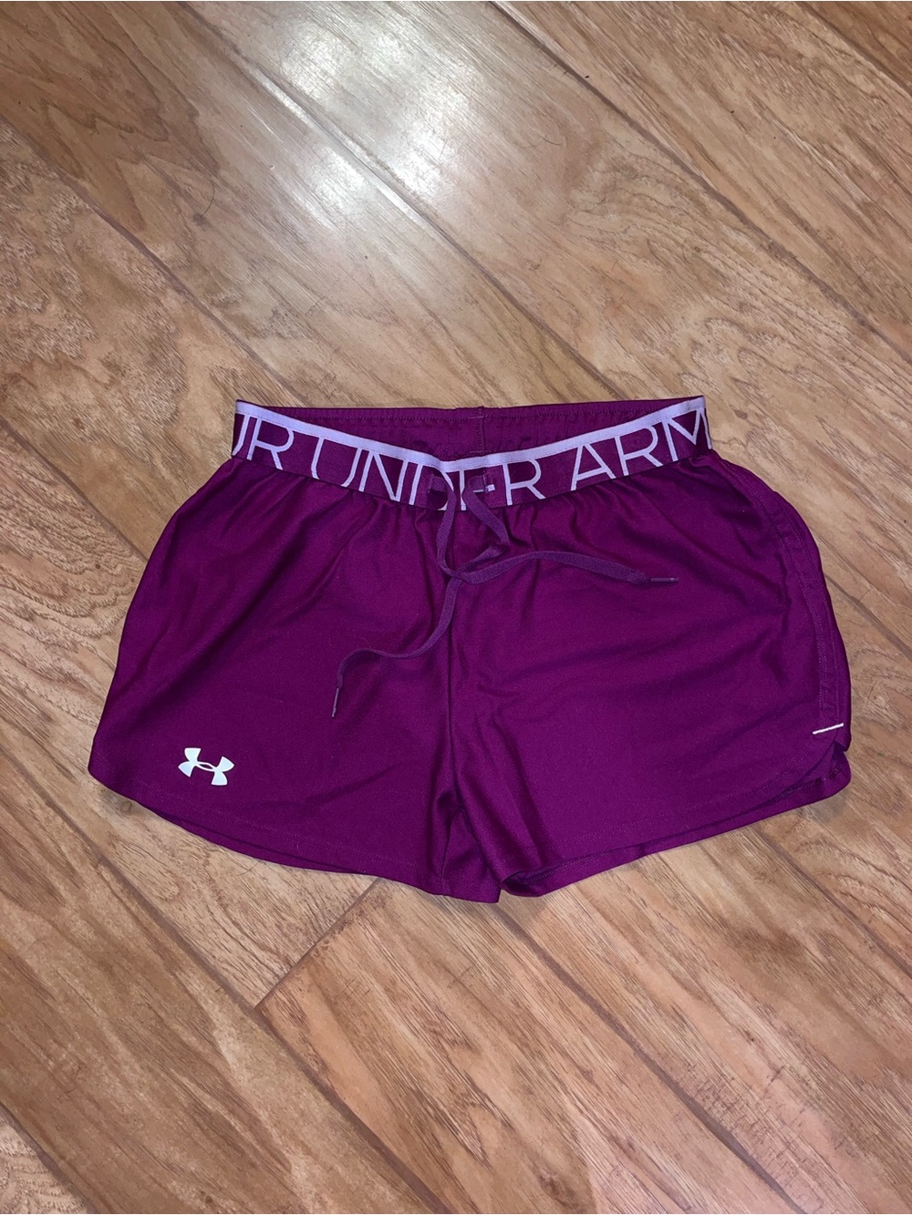 Under Armour Women's Magenta Athletic Shorts with Logo Waistband